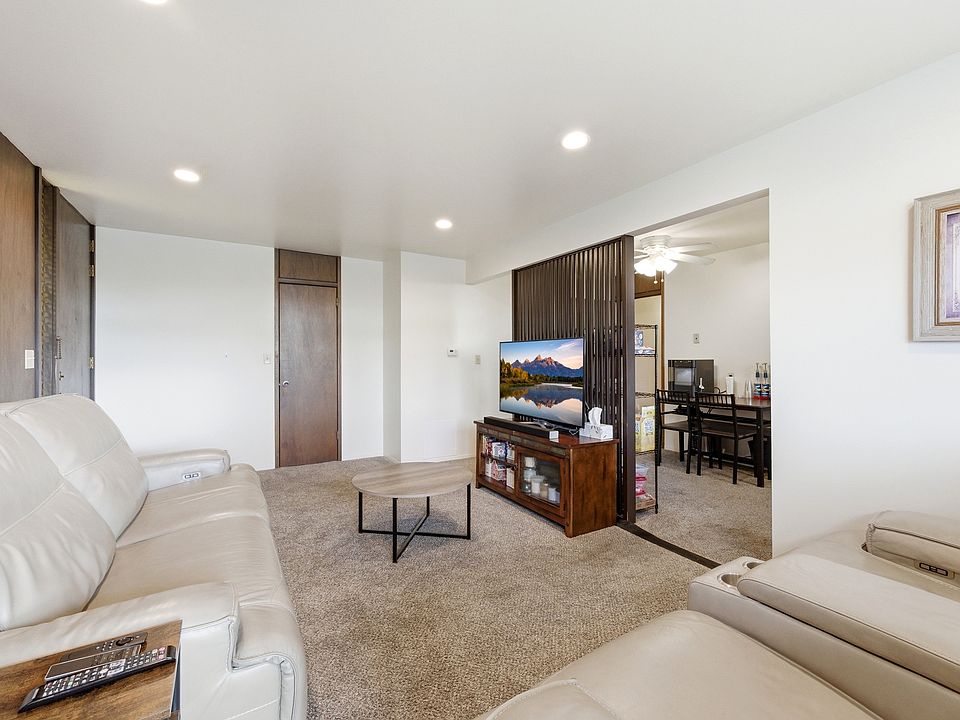 Living room looking into dining