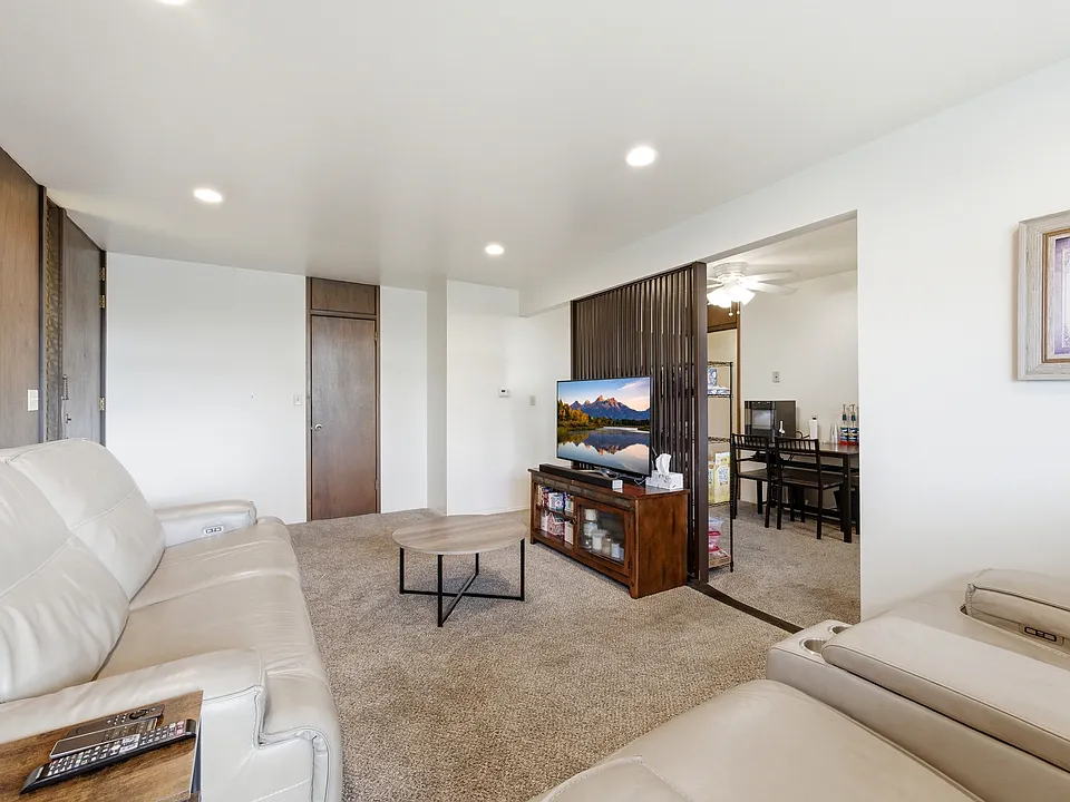 Living room looking into dining