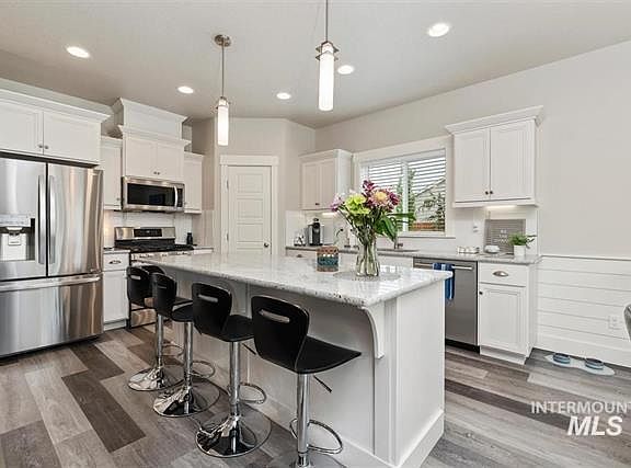 Stainless steel appliances and granite countertops