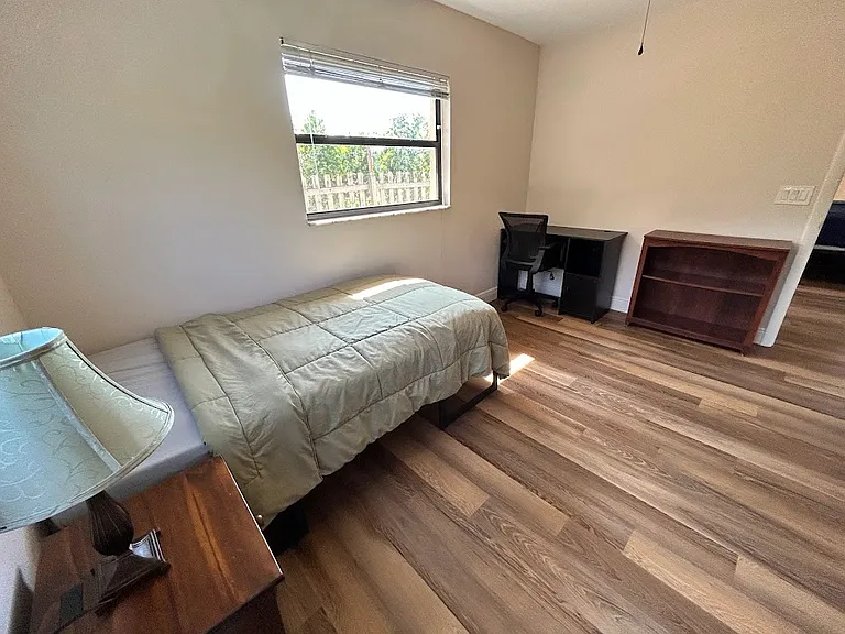 Bedroom 2 - XL twin mattress, desk with chair, side table with lamp, chair, dresser