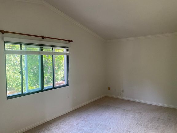 Master bedroom with dual pane windows to block noise