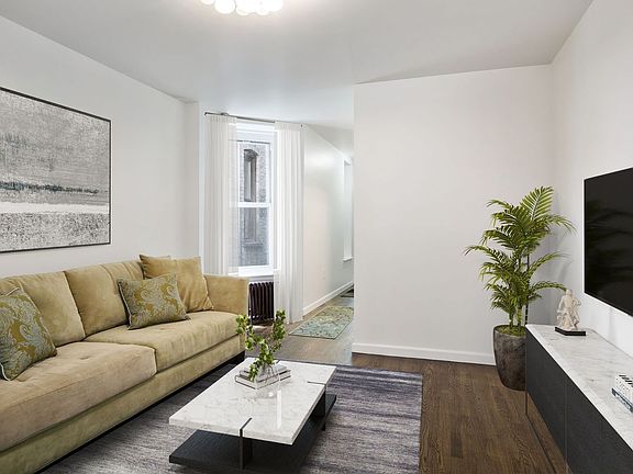 2nd image of 517 W 48th St APT 3RE
