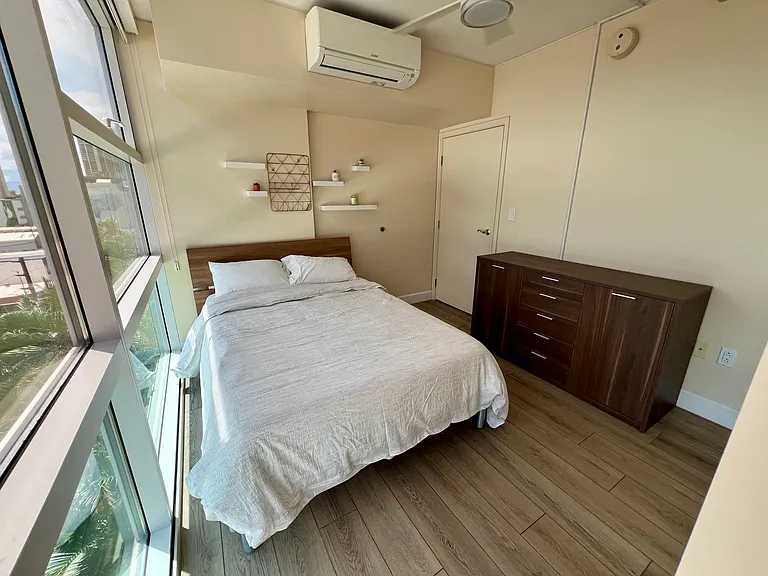 Full size bed in secondary bedroom