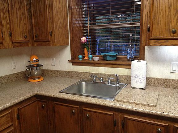 Silestone counter tops with updated sink and faucet