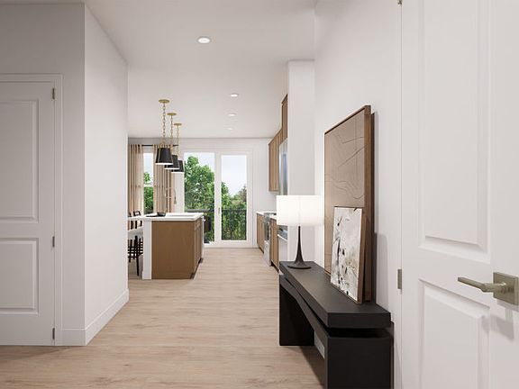 Entry s View into Well-Appointed Kitchen