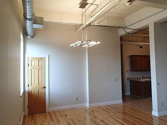View from living room to dining area and kitchen