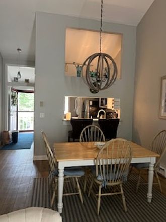Dining area and has 6 chairs.