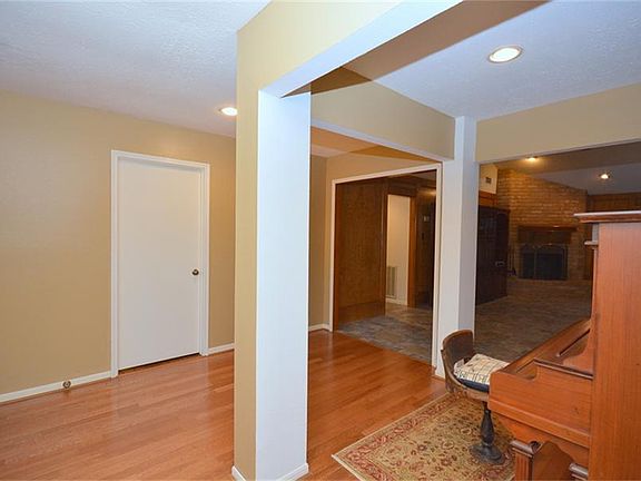 Bonus area! Atrium was eliminated and a piano sits here now! Former atrium space was also used for walk-in pantry!