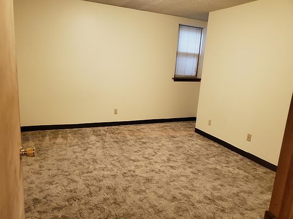 Larger of the two bedrooms