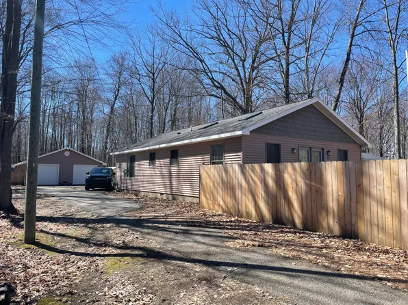 213 Welch Rd, Houghton Lake, MI 48629