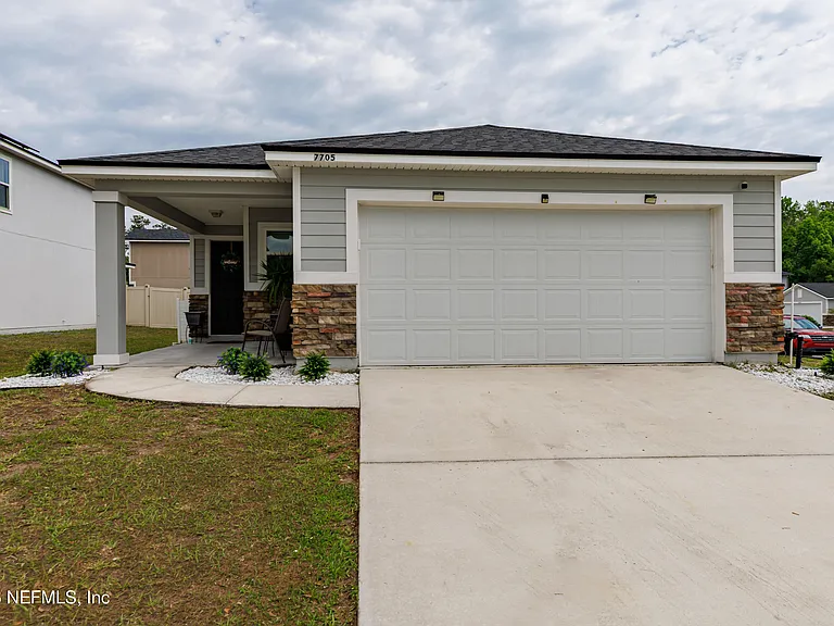 7705 Peace Ln — Photo 1