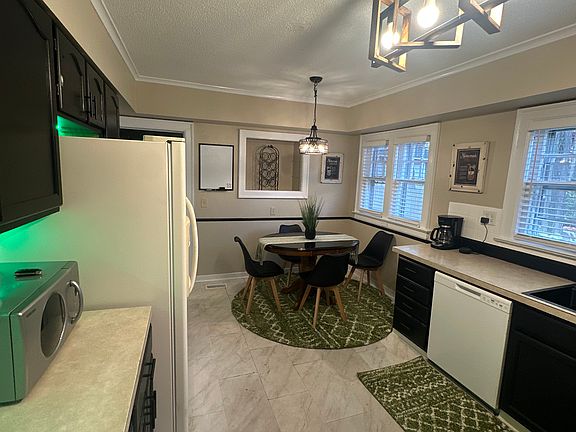 microwave, ice and water dispenser fridge, air fryer, toaster oven, knife set,all pots,pans,dishes and glassware furnished!!