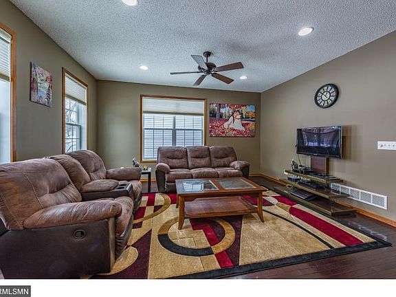 Your attention will also be drawn to the beautiful dark solid maple flooring, still in like-new condition!