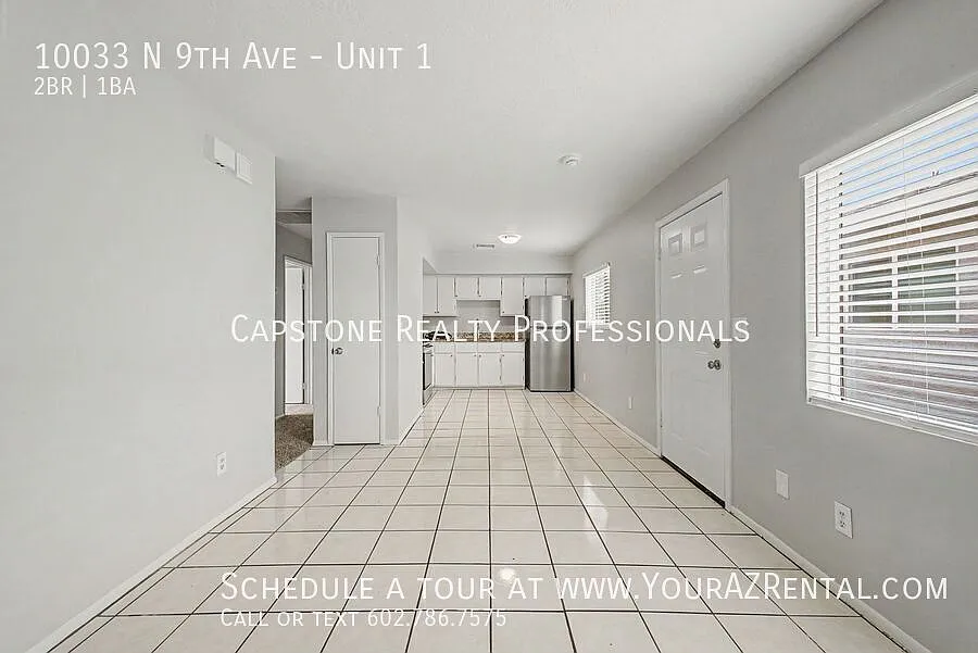 Building Photo - 10033 N 9th Ave #1