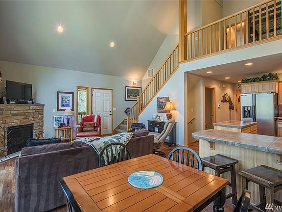 Great room with living space, dining space, kitchen bar seating too! All open to the kitchen for great entertaining.