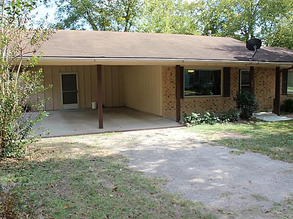 Large double carport.  Lots of trees and home on nice quiet street!!