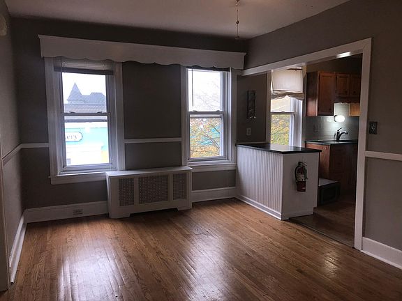Dining room & open kitchen with three windows