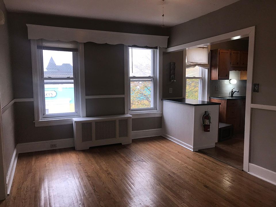 Dining room & open kitchen with three windows