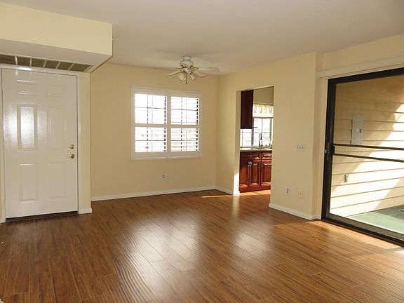 Living room looking towards the kitchen and dining area