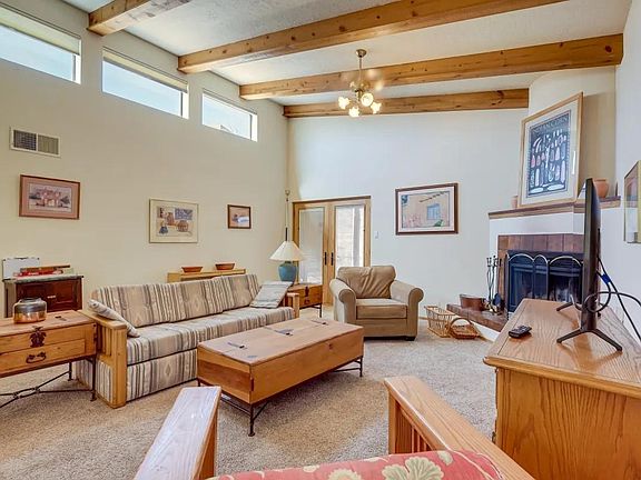 Living room facing toward fireplace.