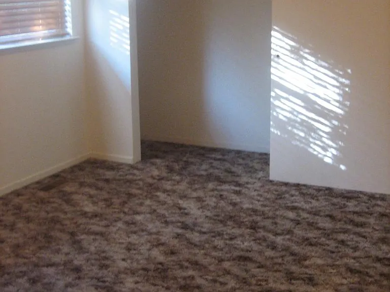 Two Large Bedrooms Upstairs With Full Length Wall Closets
