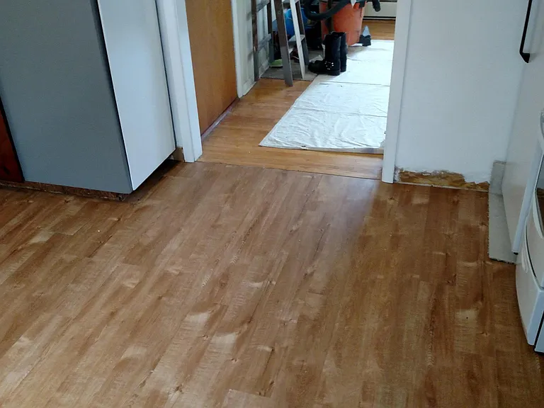 Great real hard wood maple floors throughout Living room, hall, bedrooms. New LVL hickory floor in kitchen.