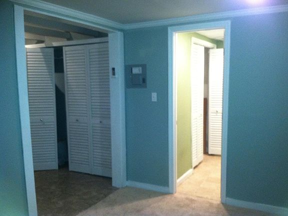 looking into bath and entry from bedroom area