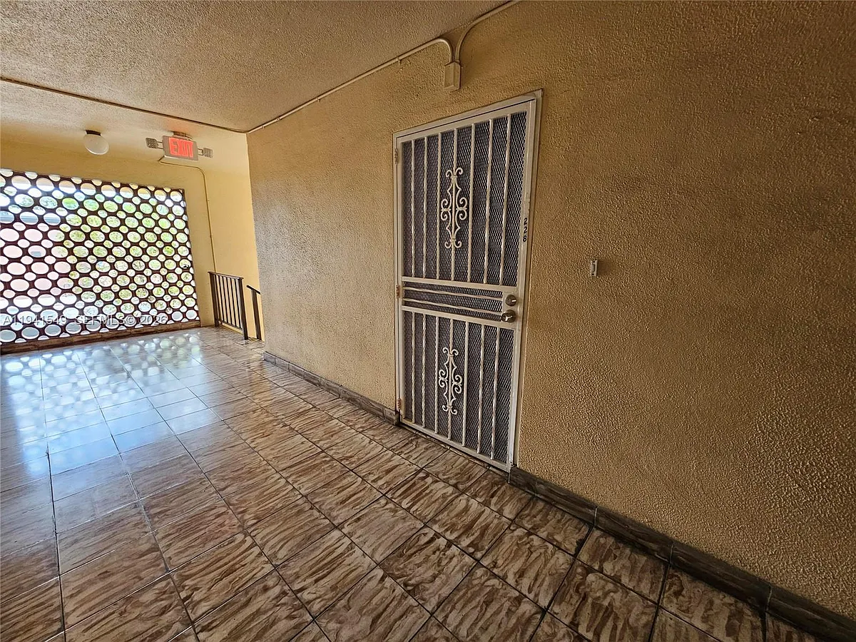 Building Photo - 8990 SW 24th St #228