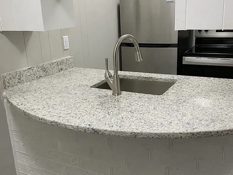 Pass-Through Breakfast Bar with Granite Counter