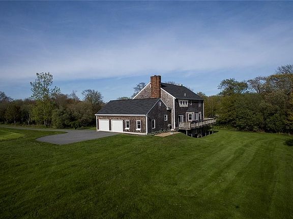 Side view of home sitting on 3 acre lot