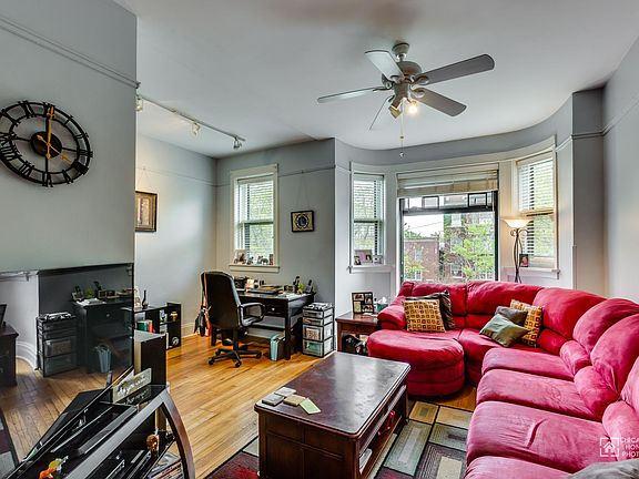 please note that the red sectional is oversized.