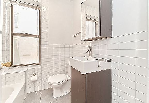 5th image of 313 E 95th St APT 18