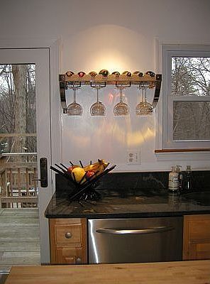 Kitchenaid dishwasher, windows and recessed lighting in kitchen