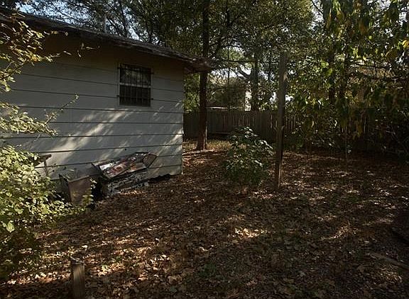 Side view of house looking toward rear of home.