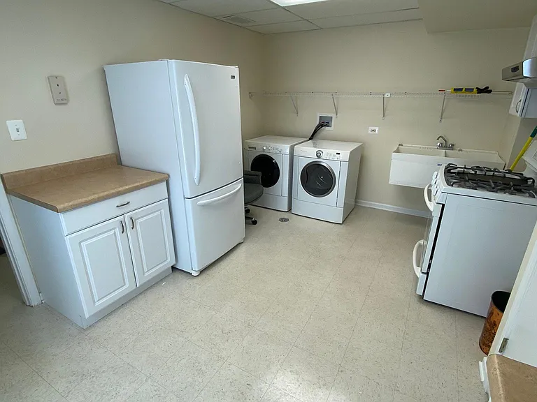 Lower level small kitchen and 2nd laundry