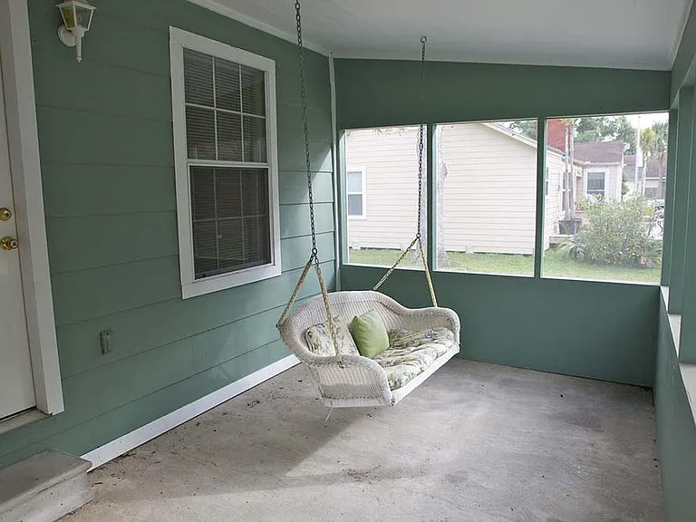 Swing on screened porch.