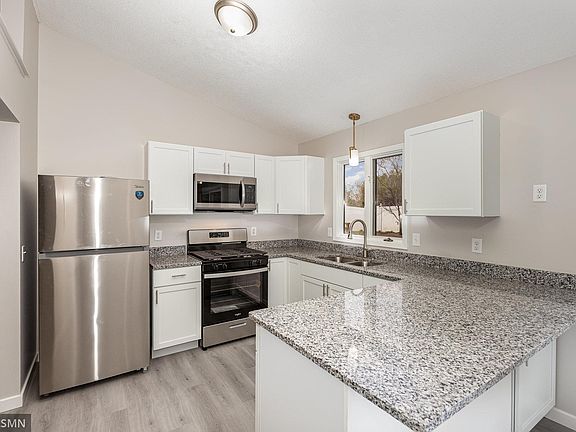5th image of 8437 Sheridan Ave N