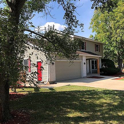Yard side view of house