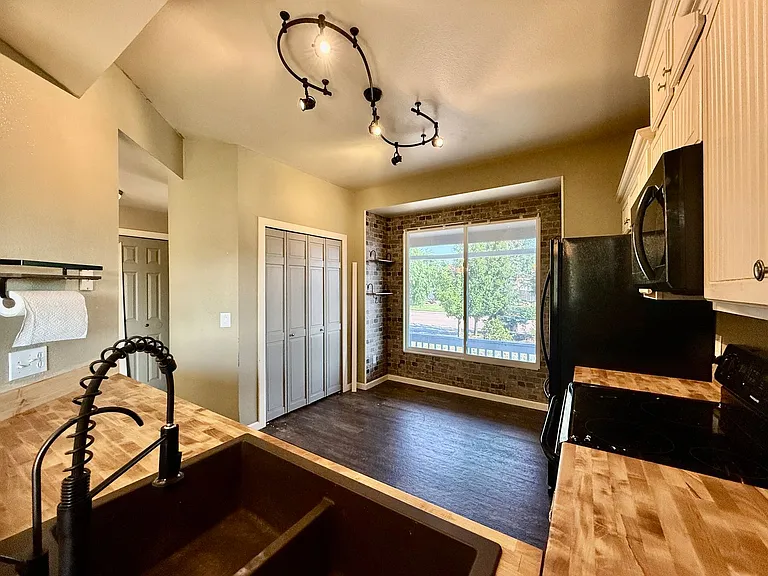 8306 Tibbs Rd — Photo 2