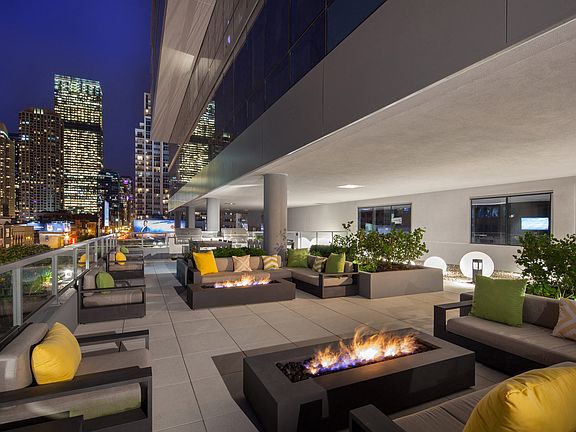 Immersive Chicago skyline views from residences and community spaces