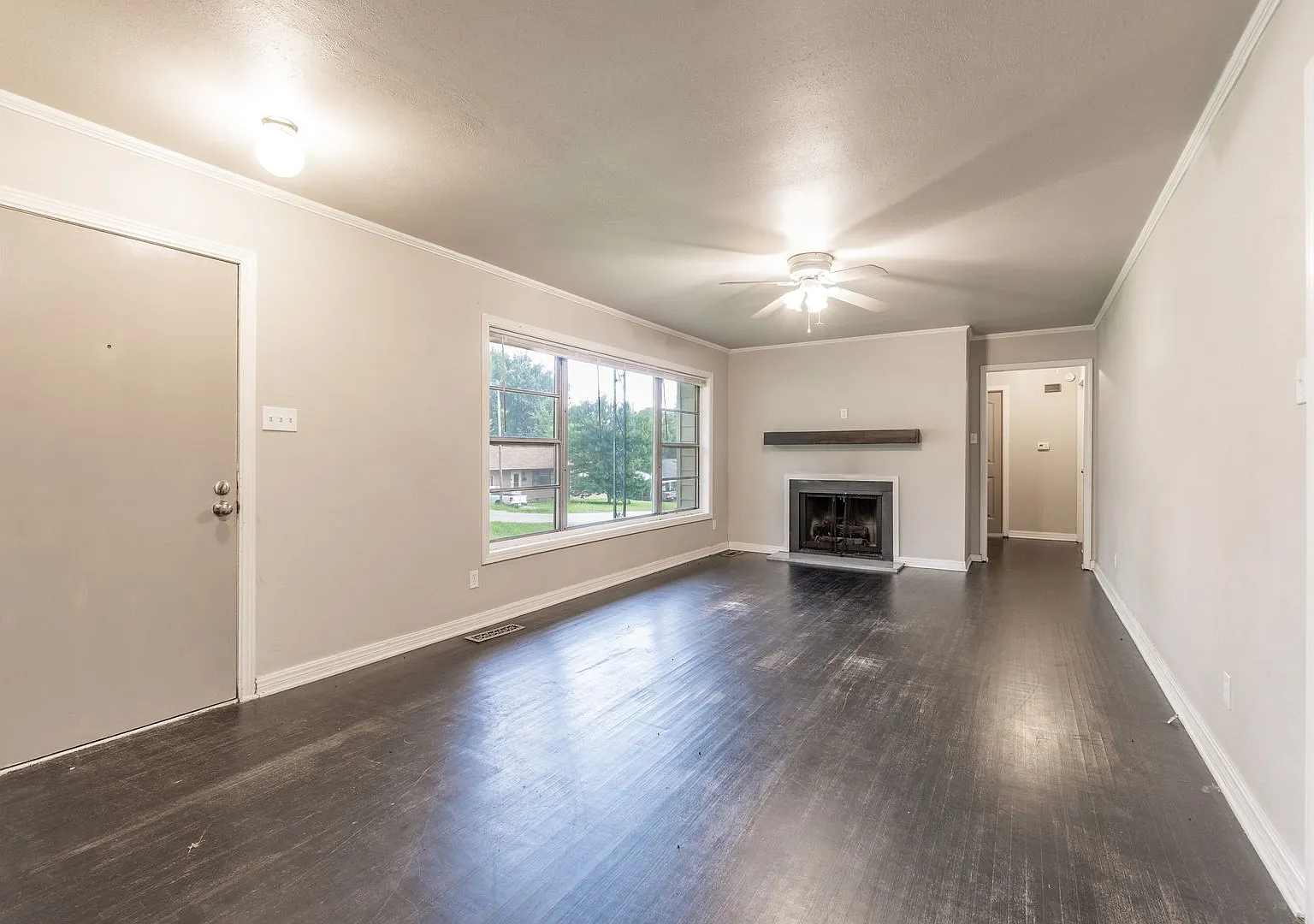 Cozy Comfort in a Great Location: Spacious 3 Bed, 1 Bath Residence with Carport! — Photo 2