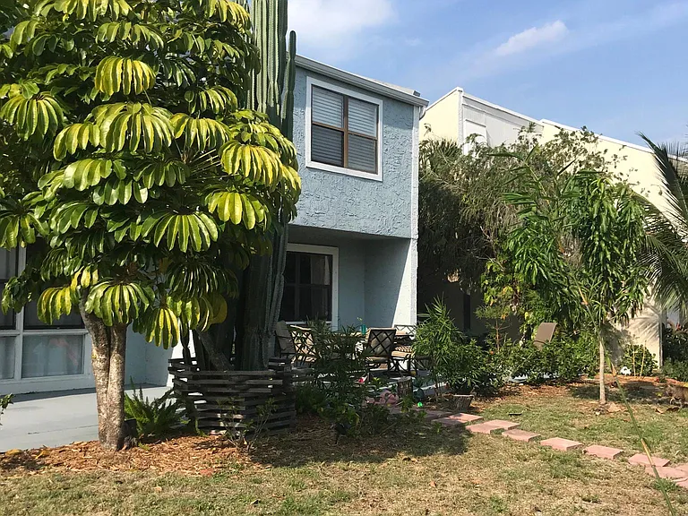 Front yard with south facing patio.