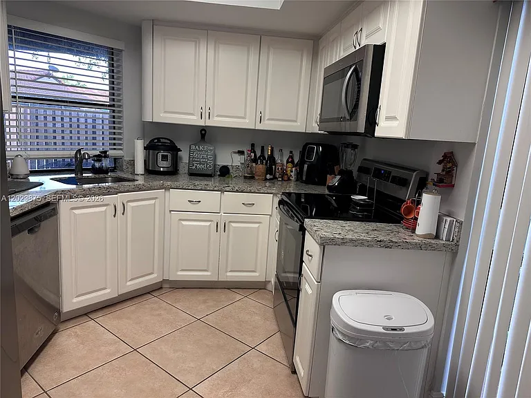 15205 SW 48th Ter #H-80 — Photo 2