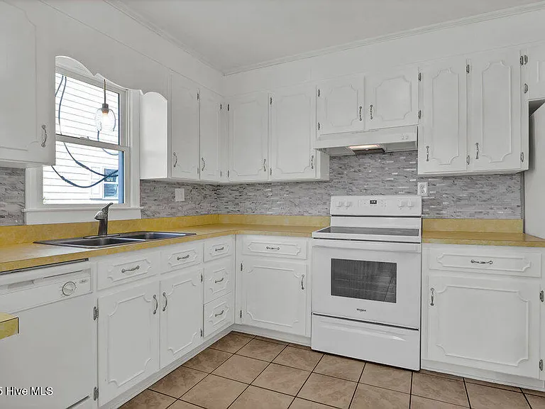 1207 N Topsail Dr — Photo 31