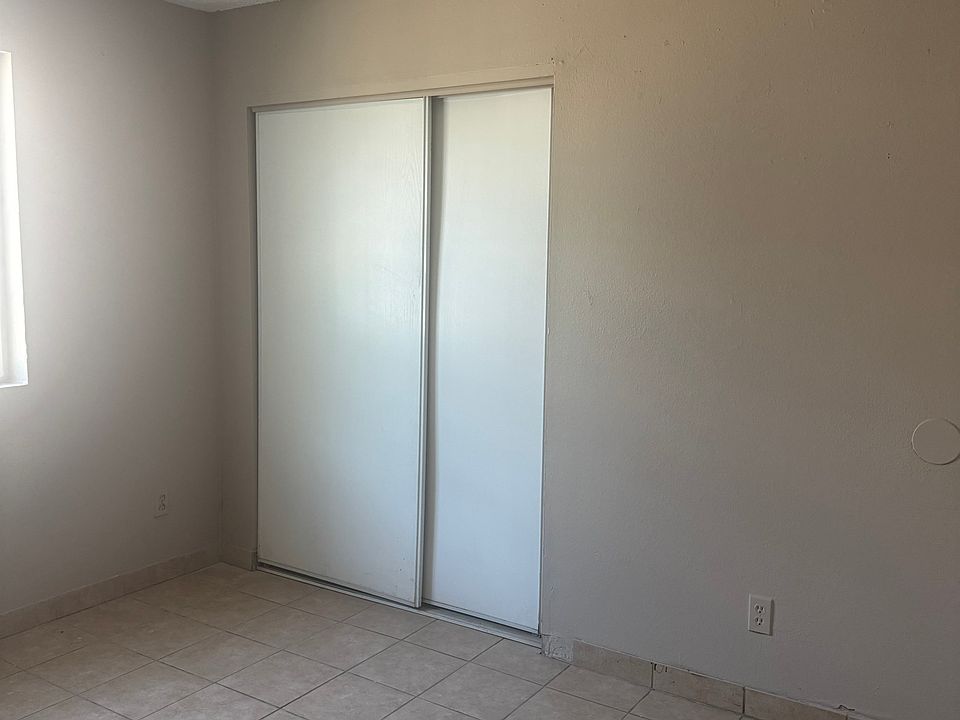 Bedroom 1, large closet, window