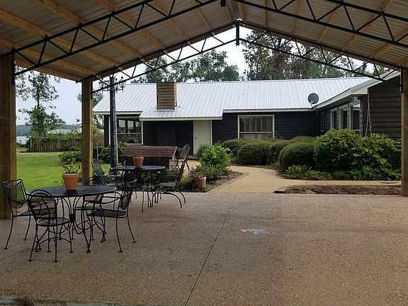 Looking from pole barn to back door