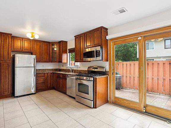 42" cherry cabinetry & gas cooking!