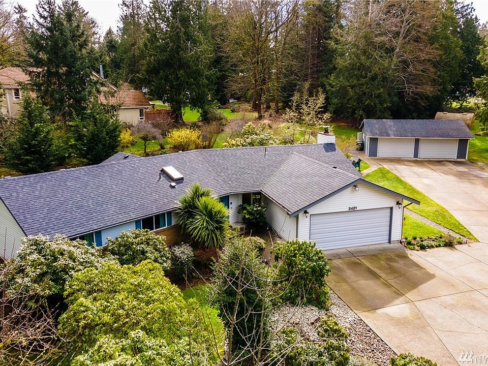 This charming rambler, nestled on a level 1 acre parcel offers the best of both worlds--country living just minutes from town & shops.