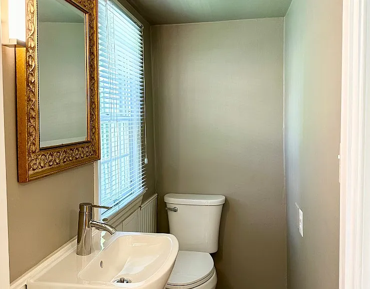 Half Bathroom Adjacent to the Formal Dining Room