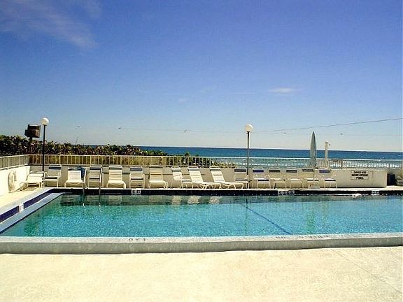 Heated pool, ocean background